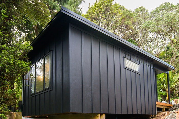 New Wave Construction Titirangi Studio Exterior Black in Green Bush